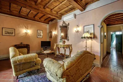 Area soggiorno di Pergola Apartment