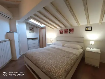 Letto o letti in una camera di Alloggi Francesco
