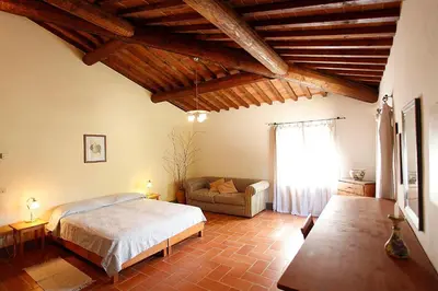 Letto o letti in una camera di Corzano e Paterno