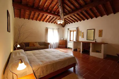 Letto o letti in una camera di Corzano e Paterno