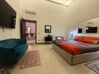 Letto o letti in una camera di Scuderie Il Magnifico