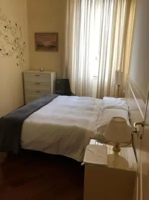 Letto o letti in una camera di Blu