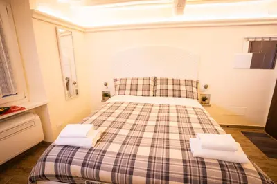 Letto o letti in una camera di Suite 