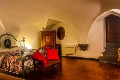 Letto o letti in una camera di Esclusivo appartamento Al Duomo