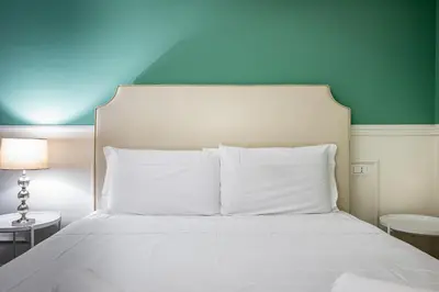 Letto o letti in una camera di Garibaldi Luxury apartments