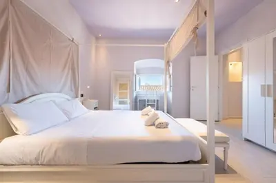 Letto o letti in una camera di [Maison] Brunelleschi - 50m dal Duomo, Ascensore