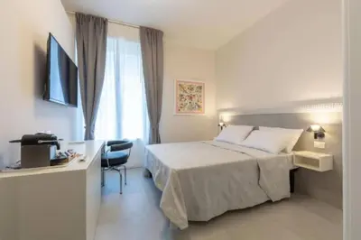Letto o letti in una camera di Stylish four bedrooms apartment - Florence center