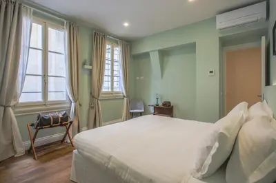 Letto o letti in una camera di Seggiole Boutique Apartment Ginestra