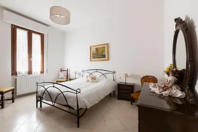 Letto o letti in una camera di Casa Gina - Welcome in Italy!