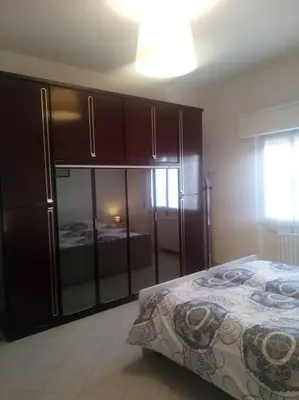 Letto o letti in una camera di Casa Gina - Welcome in Italy!