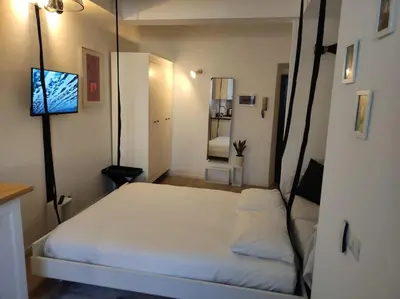Letto o letti in una camera di Appartamento Galgano Prato centro