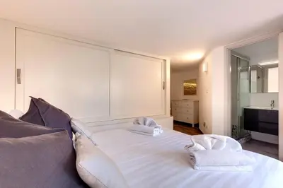 Letto o letti in una camera di Rachel Apartment by Mamo Florence