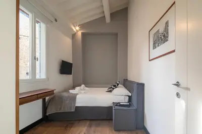 Letto o letti in una camera di Sole Apartment