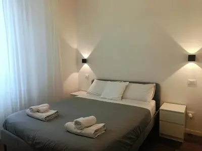 Letto o letti in una camera di Suite 59