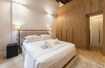 Letto o letti in una camera di Apartments Florence- The retreat