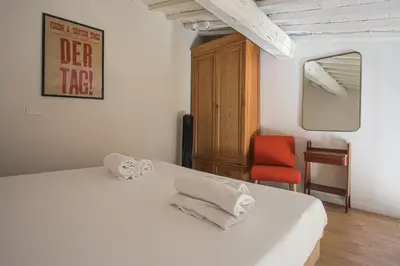Letto o letti in una camera di Loft Libertà No2