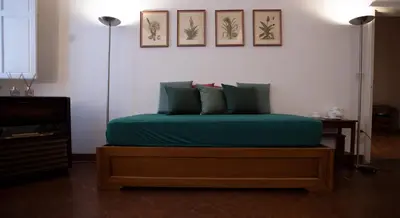 Letto o letti in una camera di Wine Apartments Florence Bolgheri